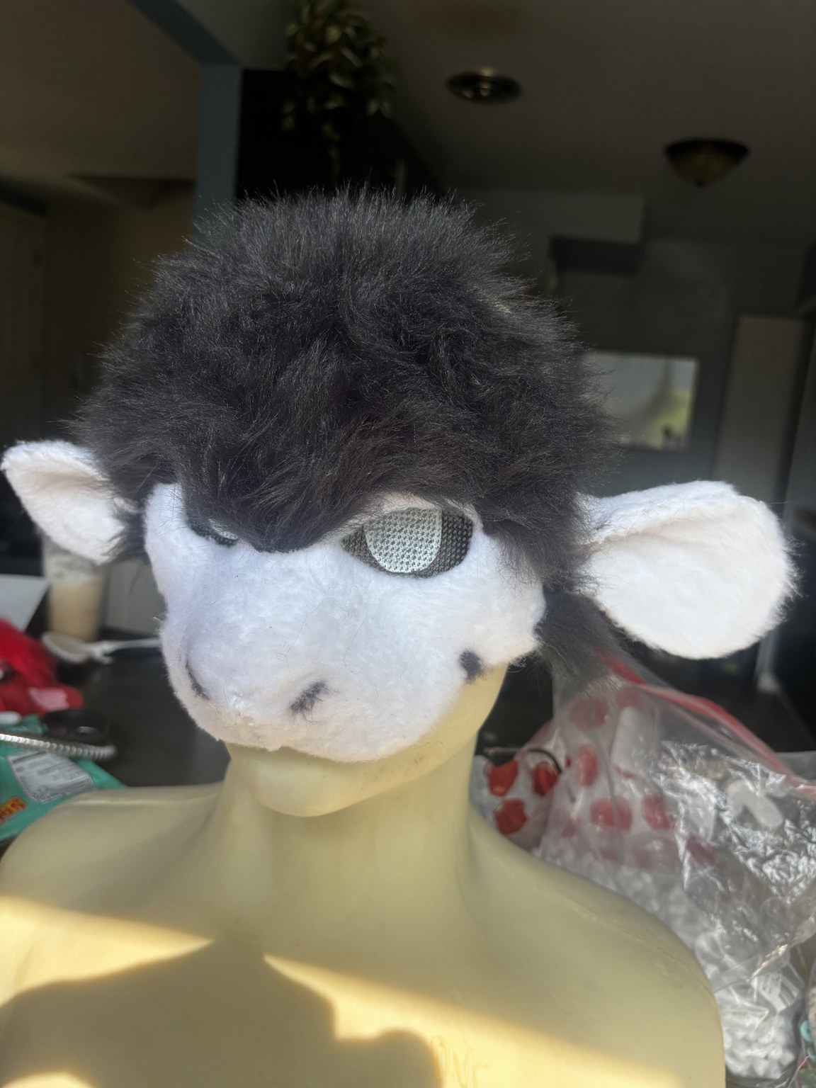 Black and white fur creature mask