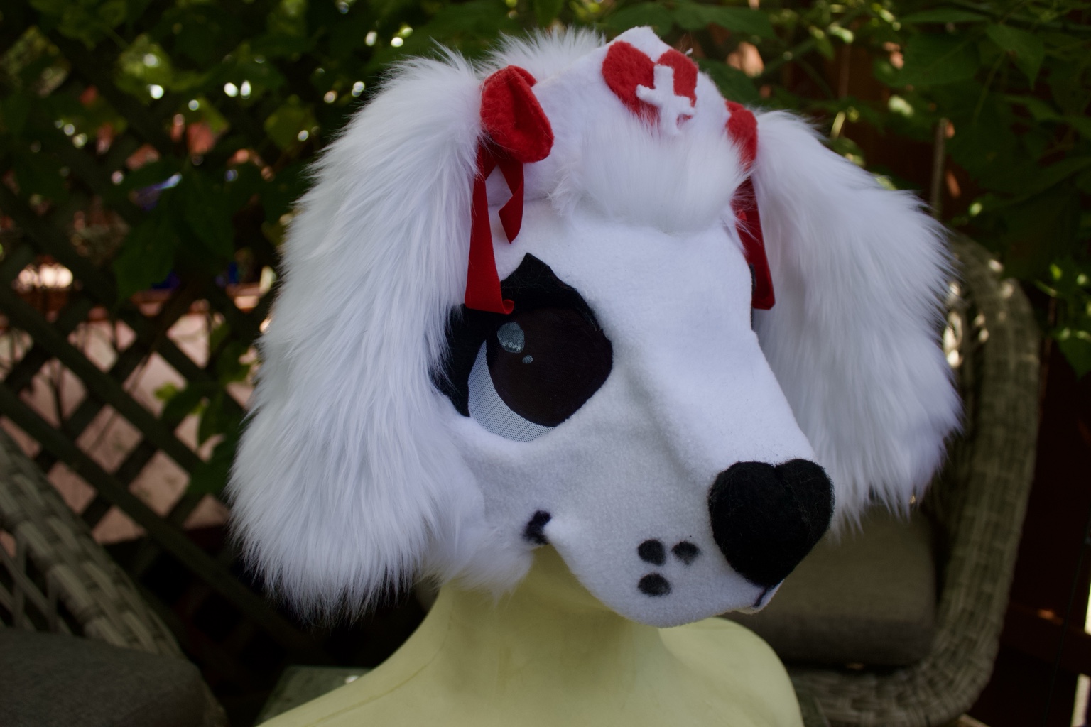 White nurse dog creature mask with long fur ears and red details
